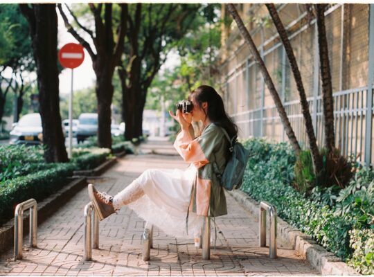 Woman doing street photo shoot.