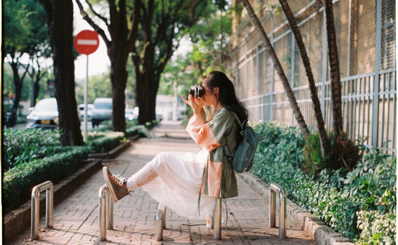 Woman doing street photo shoot.